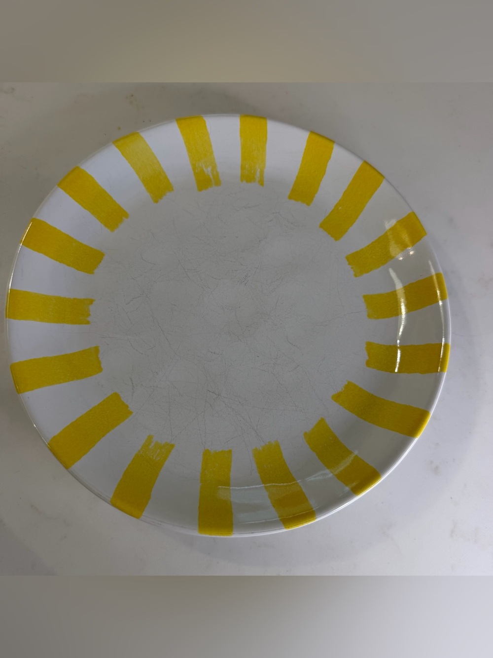 Crate and Barrel White Ceramic Plate with Yellow Brushstroke Rim